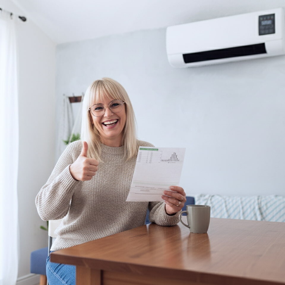 Happy UK customer with her lower energy bill after switching to EpiCooler